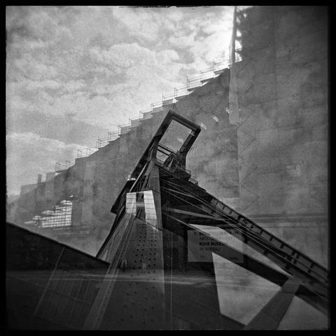 A b/w double exposure shot of Zeche Zollverein (Essen, Germany) taken with medium format camera HOLGA 120CFN.
