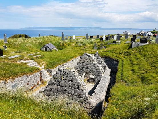 The roofless ruin of St. Caomhán’s church on Inisheer one of the Aran Islands Galway Ireland