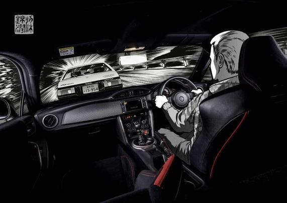 Interior shot of car behind the driver looking out of the screen at the car in front