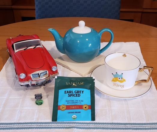 A road trip tea tableau to celebrate a homecoming. The tea is Spiced Earl Grey.