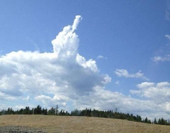Image of a cloud that looks like it's giving the finger.
