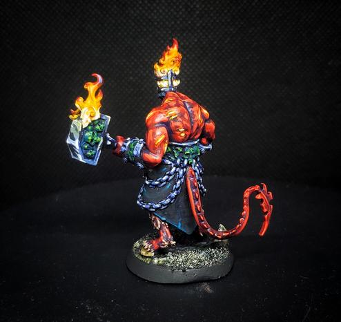 The same miniature from another rear angle, showcasing the hammer.