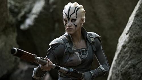 A shot of Jaylah holding her weapon.