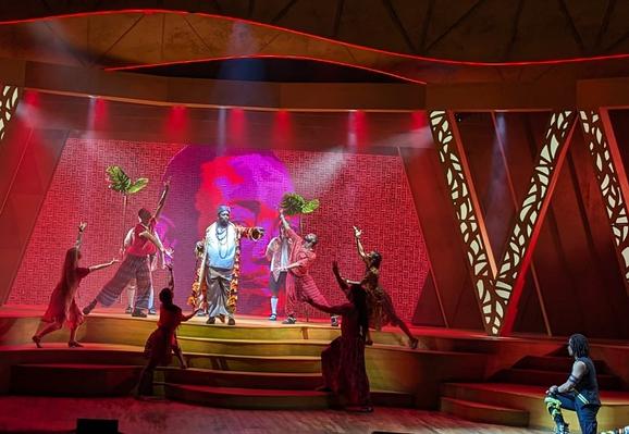 A stage production of Malvolio by the Classical Theater of Harlem with characters onstage.