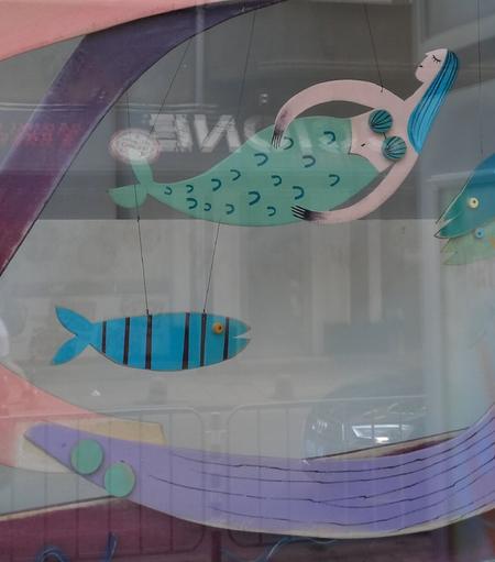 A mermaid, two fish, and something I choose to call an eel.