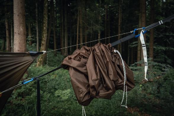 Detailed view of the hammock and tarp attachment