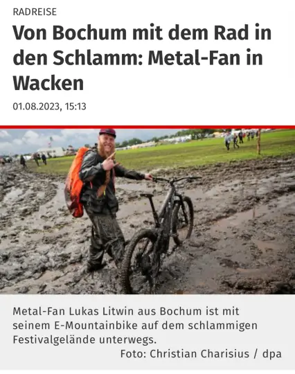Screenshot aus einer Zeitung eines Radfahrers samt Rad im Schlamm.