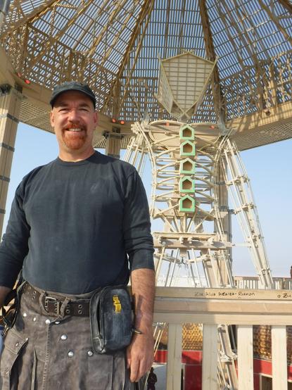 A photo of me at the Burning Man event in 2017. My hair and beard are dyed red and I'm wearing a kilt I've had since the late 90s. 

To the right you can see the iconic Burning Man figure. 

The event theme was Radical Ritual. You can find more at: https://burningman.org/about/history/brc-history/event-archives/2017-event-archive/2017-art-theme-radical-ritual/