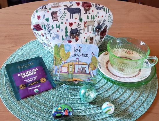 A tea tableau about forest camping and Darjeeling tea.