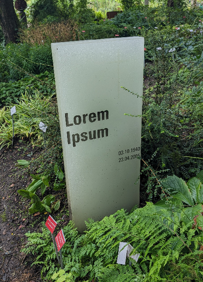 fake grave stone with "Lorem Ipsum" as name on it