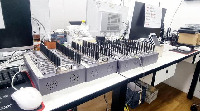 BIG OPERATION. Authorities recover a multi-port GSM blaster machines used for cyber scam operations during their raid on SA Rivendell offices in Pasay City.

Joann Manabat