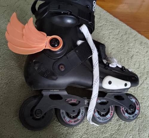 My right skate with a wing attached fresh off the 3D printer. The peach color of the resin doesn't quite match, so I'll be painting it soon.
