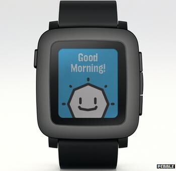 Pebble smart watch screen showing a cartoon sun and the words "Good Morning!"