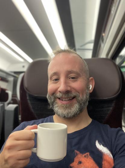 Martin is on an LNER Azuma train bound for York. He is drinking a nice cup of coffee in a proper mug. He looks happy, which is not surprising given the jolly train crew who’ve been looking after him. Martin wonders if their disposition has anything to do with LNER having been nationalised for some time and not being under pressure to cut corners to satisfy shareholder greed.