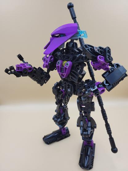 Another photo of the same creation, now holding a hand out to the side and looking in that direction, with the other hand placed on its hip.