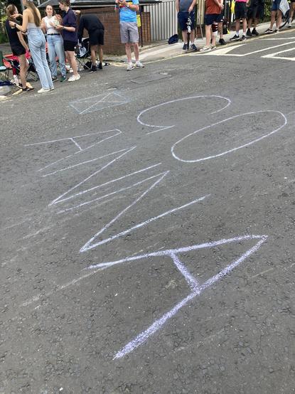 Chalk writing on Great George Street “GO ANNA”