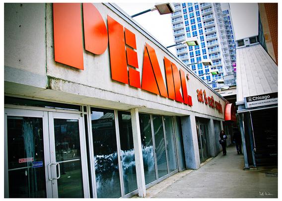 A color photograph of the sign for Pearl Art Supply on Chicago Avenue after it closed but before Walmart moved in.