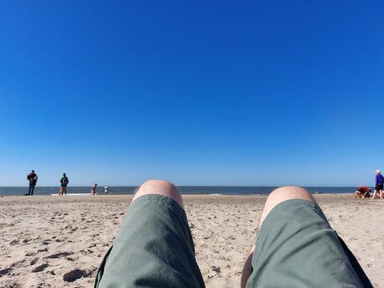 My legs pointing towards the sea at Oudorp beach.
