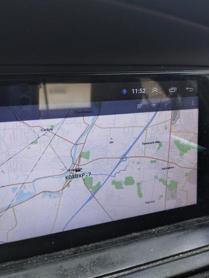 Aprsdroid running on old android car stereo head unit.  Display shows my track KD8BXP-7