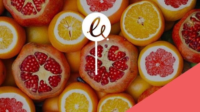 photo of some cut citrus fruit and pomegranates with a decorative angled accent to the right in bright pink and the Epimorphics swish logo in the centre in white with a vertical thick white line