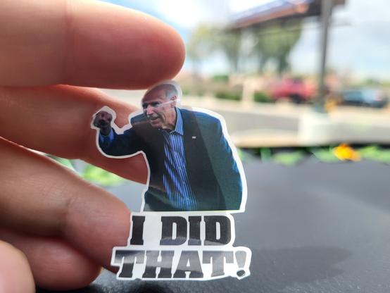 My hand holding a sticker of Joe Biden saying "I did that" that I took off where some jackass stuck it on a gas pump, and will now stick on something of mine.