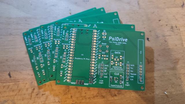 Five newly minted PsiDrive PCBs.