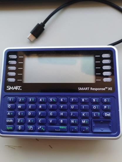 Smart Response XE system, turned off, no programmer, can see the display, and a lot of keys on the keyboard/keypad.