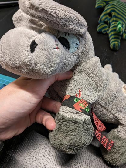 A plush donkey with a CCCamp23 wristband