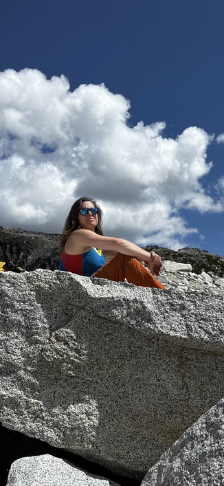 Nova staring off into the distance wearing sunglasses and looking cool AF.  This was taken from the top of Asgaard Pass.