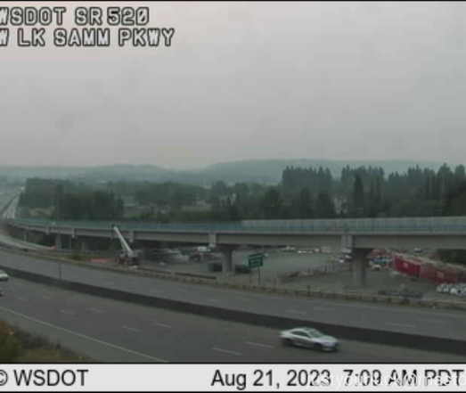 Pic of the hazy smoke taken from a Washington State DOT traffic cam. Label on the pic says 520 and Lake Sammamish Parkway (in Redmond, the same example as the chart in the previous attachment) at 7:09 AM on August 21.