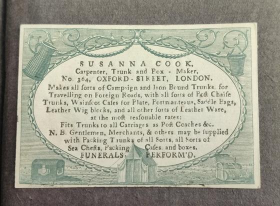 Green and Black engraved and letterpress trade card with containers in border