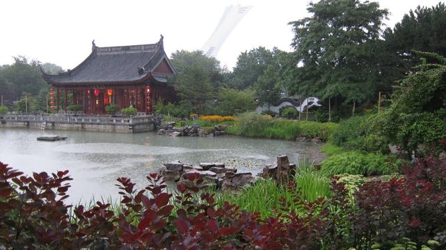 A view of the Chinese pavillion at the Montreal Botanical Gardens, with the Big O stadium tower in the background. Photo taken c. 2011.