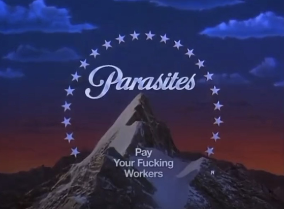 Paramount logo that says “Parasites: Pay your fucking workers”