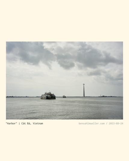 A bigger ferry closing in. The sea is flat and time seems to have stopped here