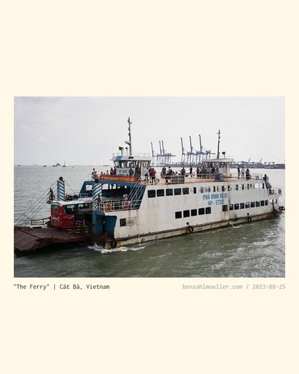 An old, rusty ferry crossing from Hải Phòng to Cát Bà.