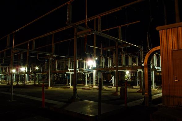 PG & E Power substation at night.