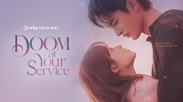 Poster for 2021 South Korean drama, “Doom at Your Service” showing Park Bo Young & Seo In Guk in an embrace with the words, “Pray for doom, love has come into life."