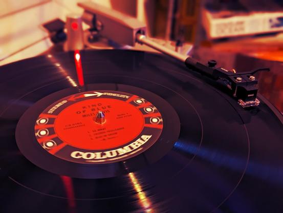 Kind of Blue LP by Miles Davis on a turntable.