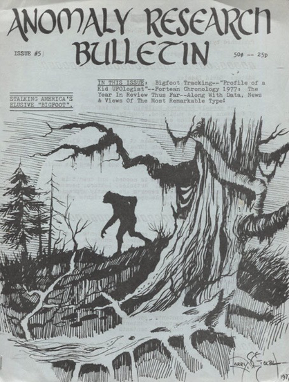 Black and white magazine cover showing an ambiguously werewolf-like creature (or Bigfoot?!!) prowling a clearing in a forest. There is a rotten tree in the foreground.