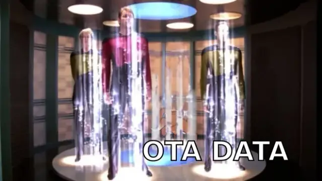 startrek tng enterprise team in beaming chamber. text next to beaming commander data: ota data
