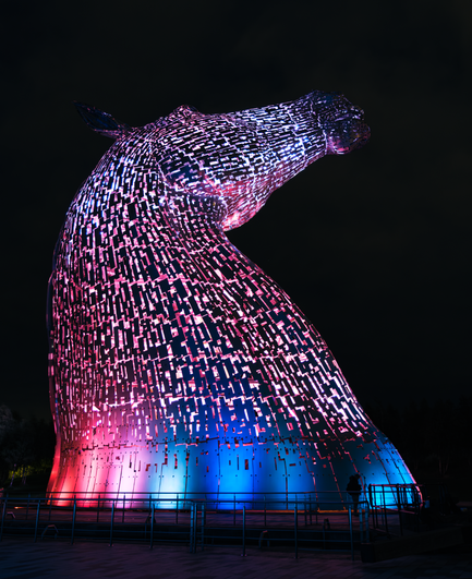 This is a photo of one of the horses heads that makes up The Kelpies, a public art installation in Falkirk, Scotland.