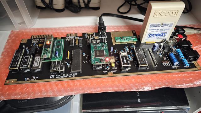 A fully populated commodore 64 mainboard with all chips represented by modern replacements.
