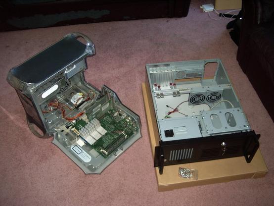An open "Sawtooth" PowerMac G4 and a 4U rackmount ATX case.