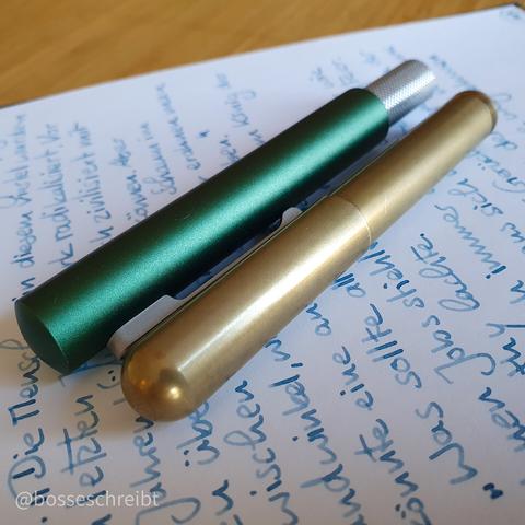A picture of two pocket fountain pens. A Namisu N2 and a Kaweco Supra.