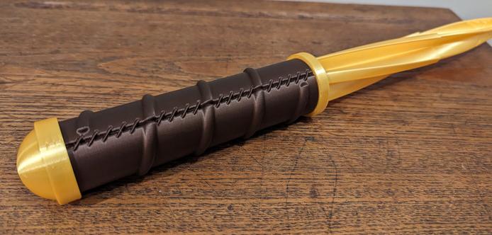 3D Printed spiral blade like the ones used in Supernatural.  Laying down