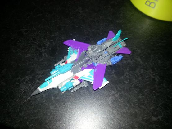 Power of the Primes DarkWing and DreadWind in their combined super-jet mode, known as DreadWing.

DarkWing makes me think of DarkWing Duck. And I've been known to produce a Dread Wind or two of my own.