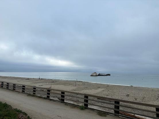 The sun teasing behind the clouds at Seacliff State Beach.