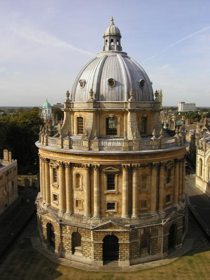 The Radcliffe Camera, a circular, Baroque, 18th century building with a domed roof.