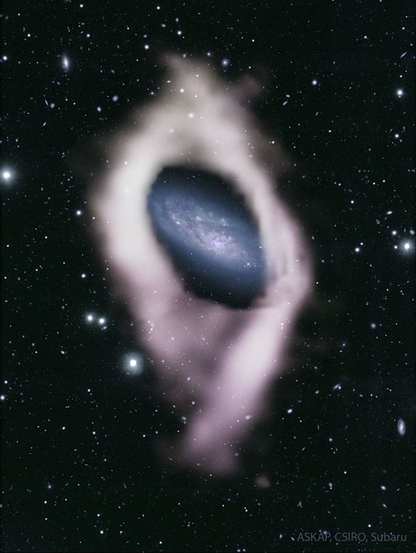 graphic of a spiral galaxy, a little edge on. Perpendicular to this is a large, ovale shaped ring of gas, superimposed on the image.
