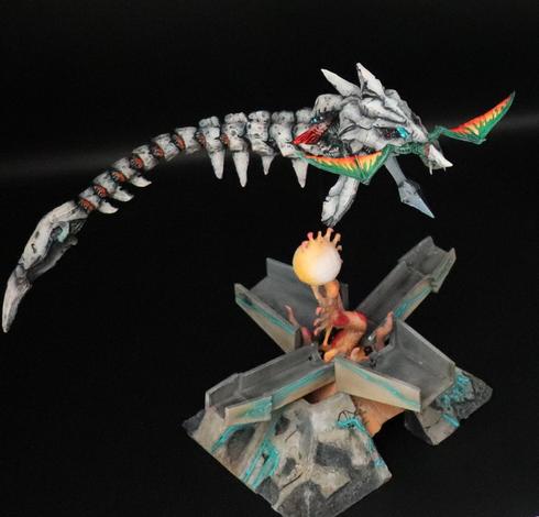 A garage kit of the Tower when it has been activated as it appears in Panzer Dragoon: Remake as well as a Prototype Dragon garage kit sculpted by UMR and painted by Ver1013.